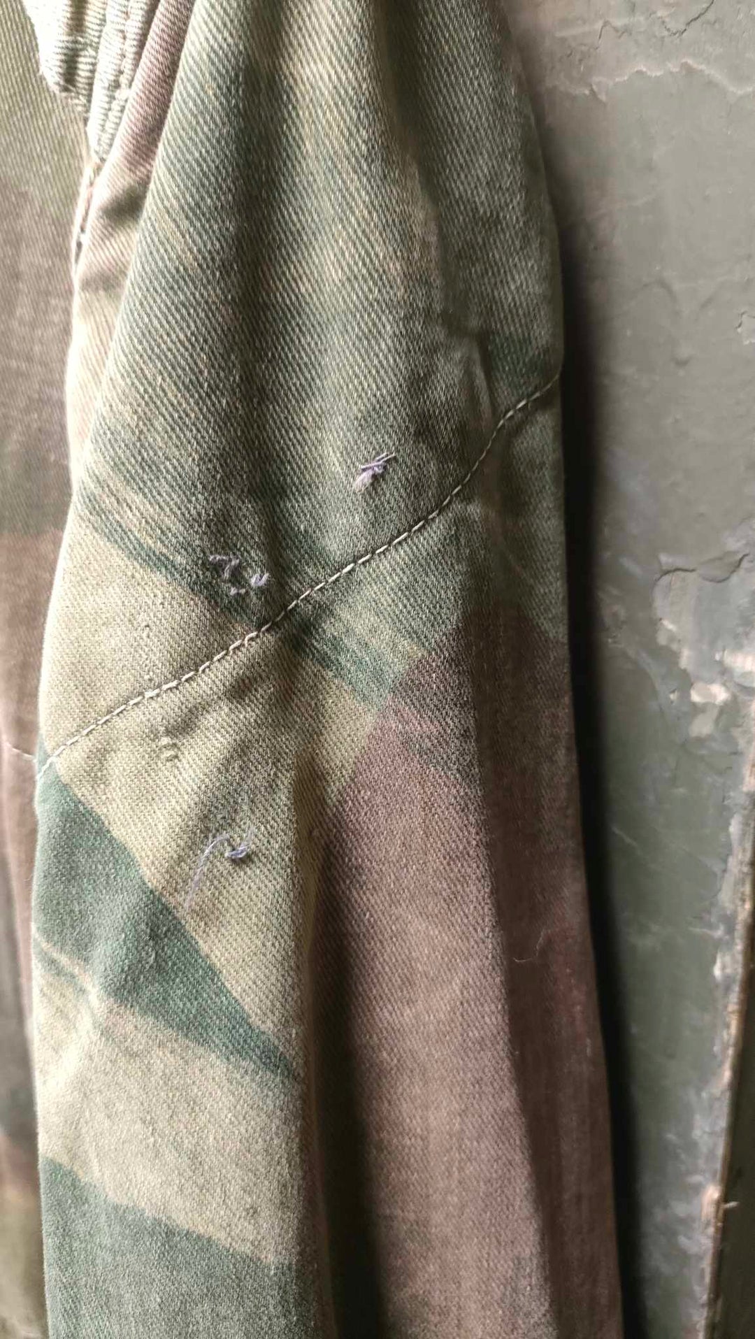 close up of small pulls in sleeve