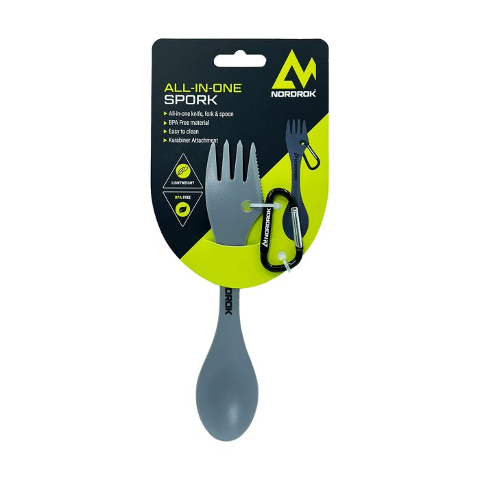 Grey double ended utensil, one end is a spoon the other is a fork with a cerated edge, attached to a black carabiner and black and green backing label.