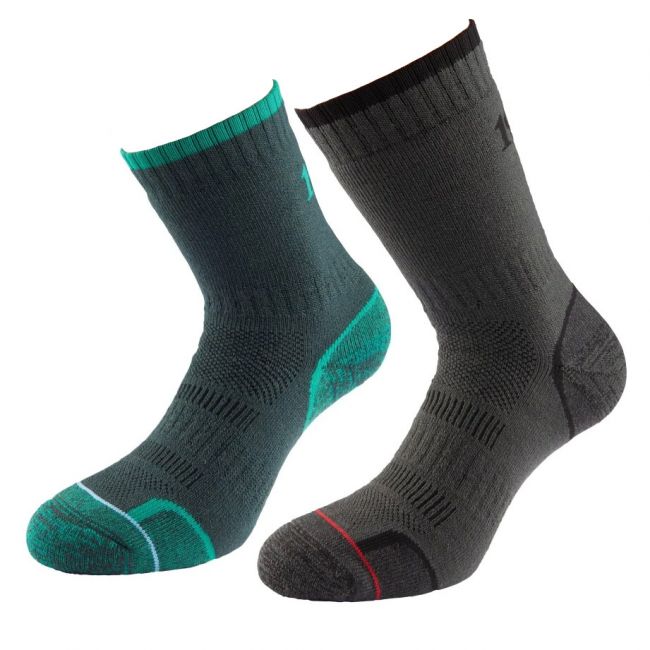 one charcoal great sports sock with green toe, heel and top detail and one charcoal grey sock with black toe, heel and top detail with a ring of red around toe.
