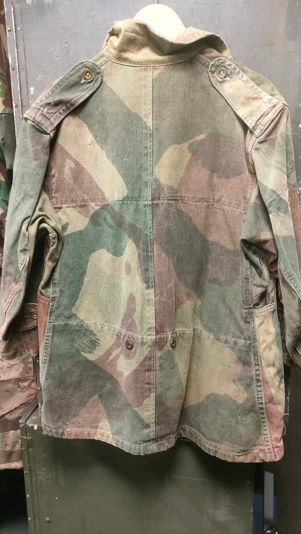 back view of camo print smock style jacket