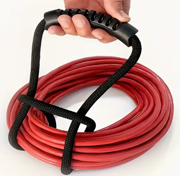 Red coiled cable with black handle held by a hand on a white background