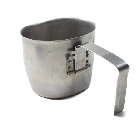 Metal measuring cup with handle on a white background
