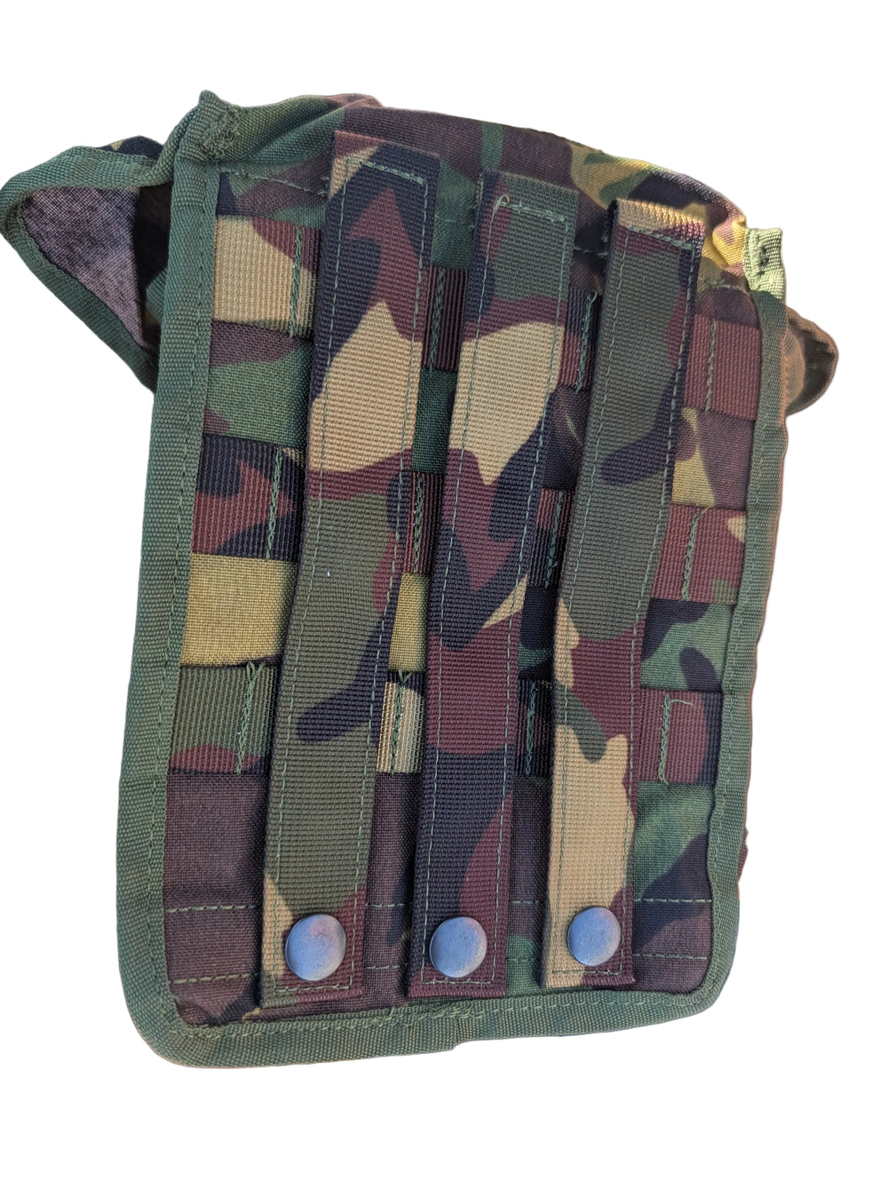 Camouflage pouch with multiple straps on a textured surface
