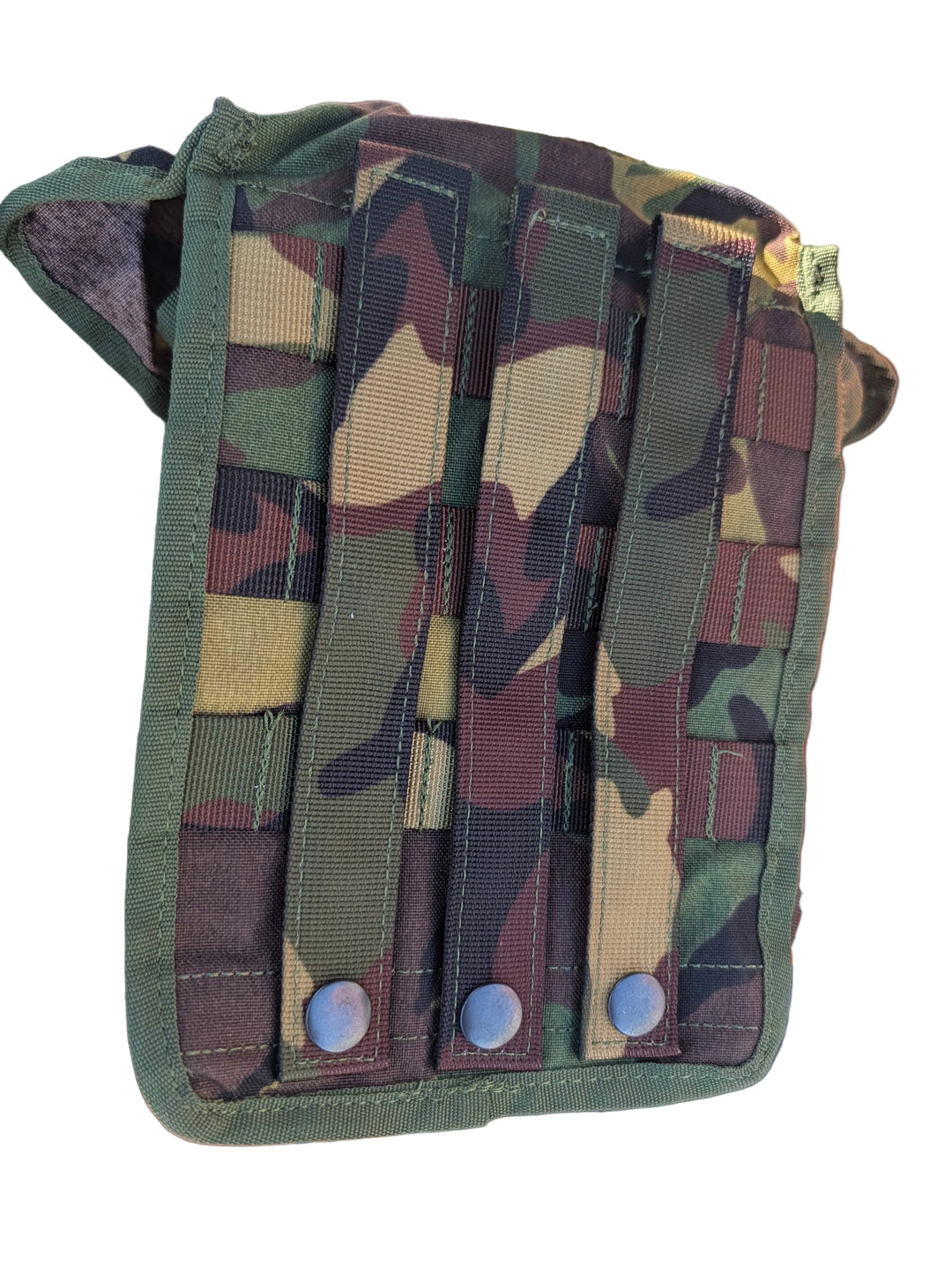 Camouflage pouch with multiple straps on a textured surface