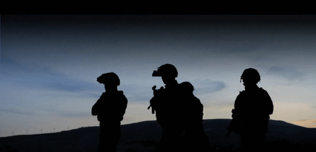 Silhouettes of soldiers at dusk – Military Mart army surplus