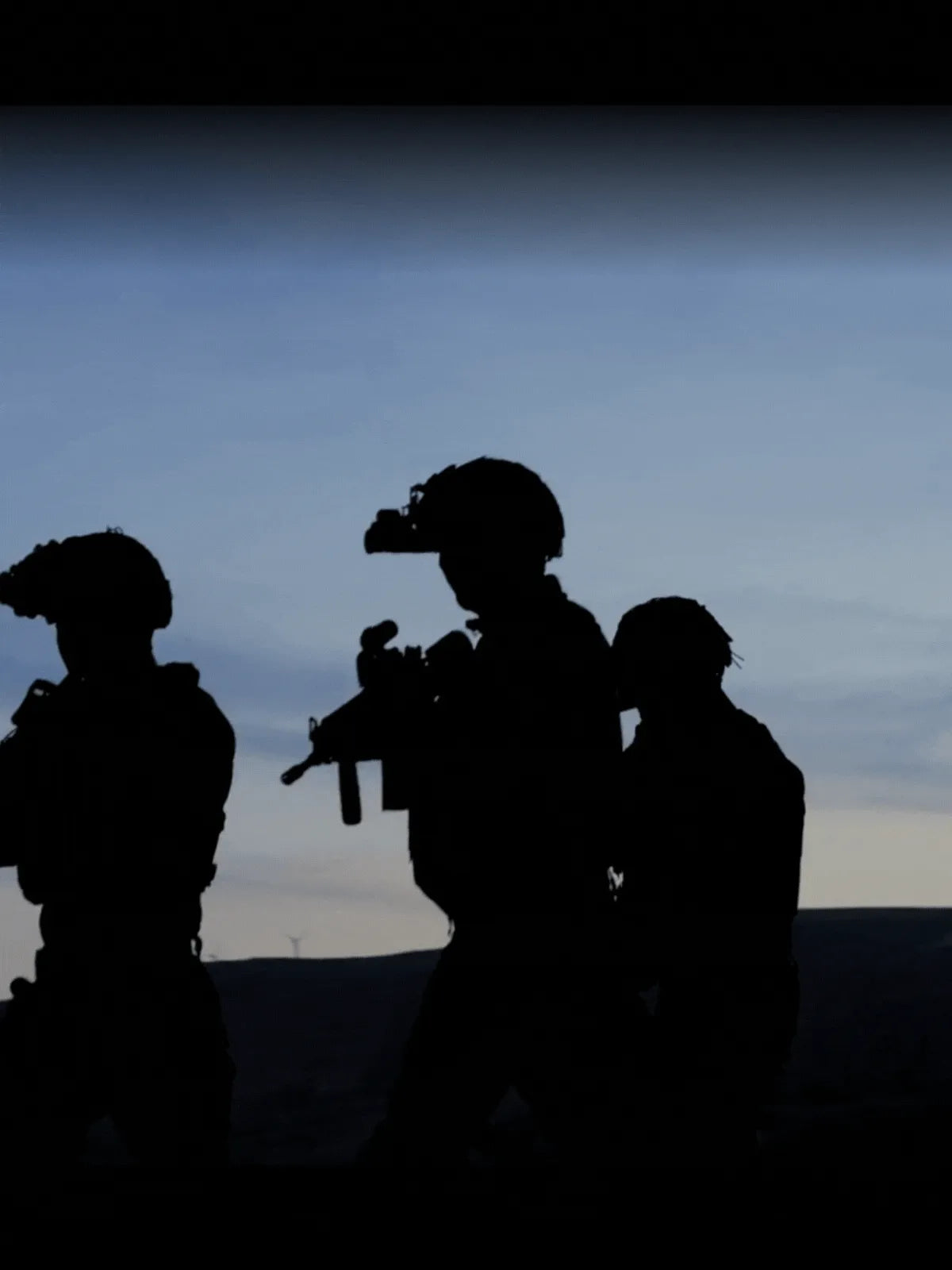 Silhouettes of soldiers at dusk – Military Mart army surplus