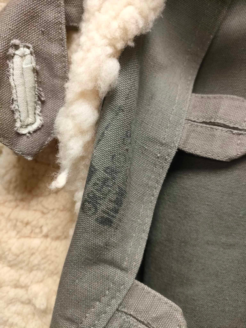 close up of printing inside lapel of jacket