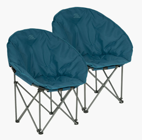 Two blue folding chairs with covers on a white background