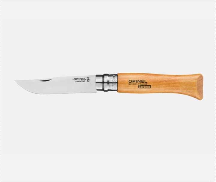 Opinel knife with wooden handle on a white background