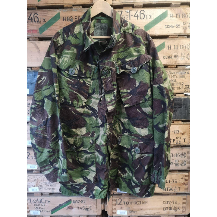 Dark green and brown camo jacket with four pockets