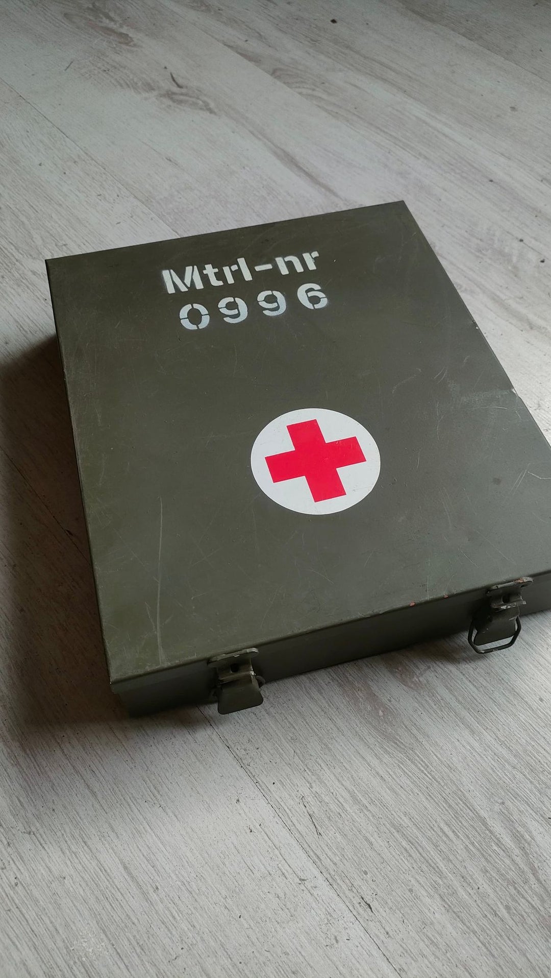 https://www.militarymart.co.uk/cdn/shop/products/swedish-vehicle-medical-first-aid-box-tin-militarymart.jpg?v=1666523898&width=1080